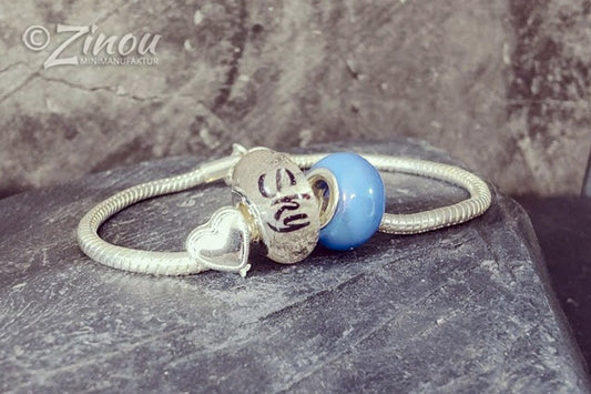 Bracelet en argent sterling avec une perle personnalisée avec le nom de votre animal, réalisée à partir de poils. Bijoux, souvenirs, cendres, fourrure, poils d'animaux.