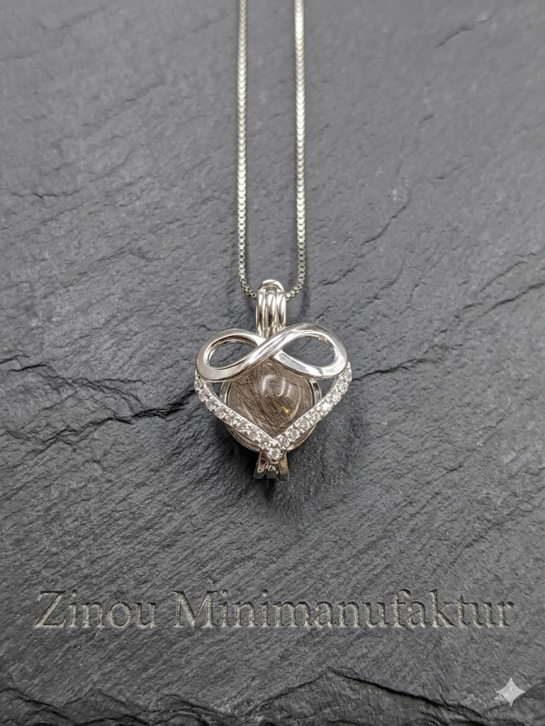 Engelsrufer Infinity animal hair jewelry pearl filled with fur, hair or ashes.