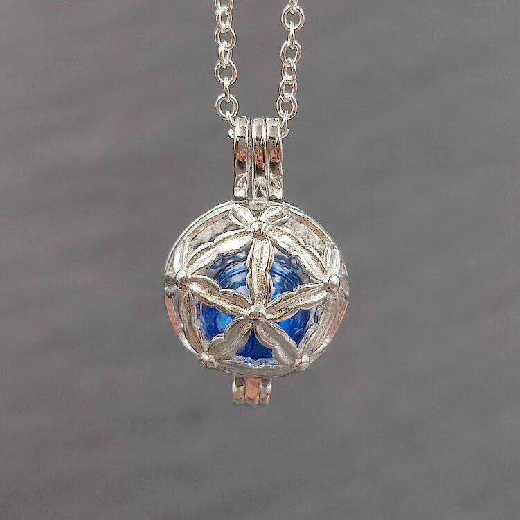 Engelrufer mit Glaskugel zum selber füllen von Asche oder Fell Gedenkschmuck
